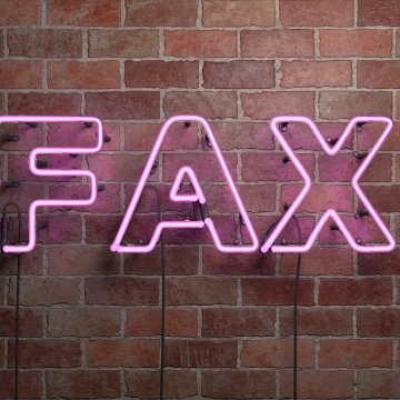 efax online fax service features neon fax written on wall 